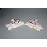 A pair of Staffordshire porcelain figures of recumbent pointers or setters, c.1835-50, 12cm