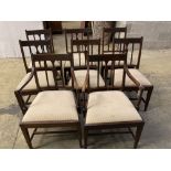 A set of eight late George III mahogany dining chairs, two with arms, six single