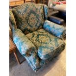 A green and cream brocade upholstered lounge armchair, width 98cm, depth 100cm, height 96cm