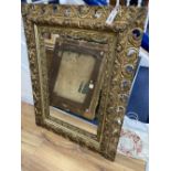 A giltwood and gesso wall mirror, width 84cm height 110cm