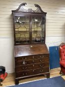 A George III mahogany bureau bookcase, width 107cm depth 59cm height 206cm