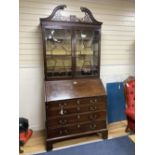 A George III mahogany bureau bookcase, width 107cm depth 59cm height 206cm