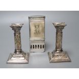 A pair of Victorian plated and embossed dwarf candlesticks and a Victorian plated pocket lamp,