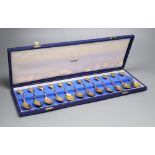 A set of 'The Twelve Roman' silver gilt spoons, sculpted by David Cornell, one of a limited