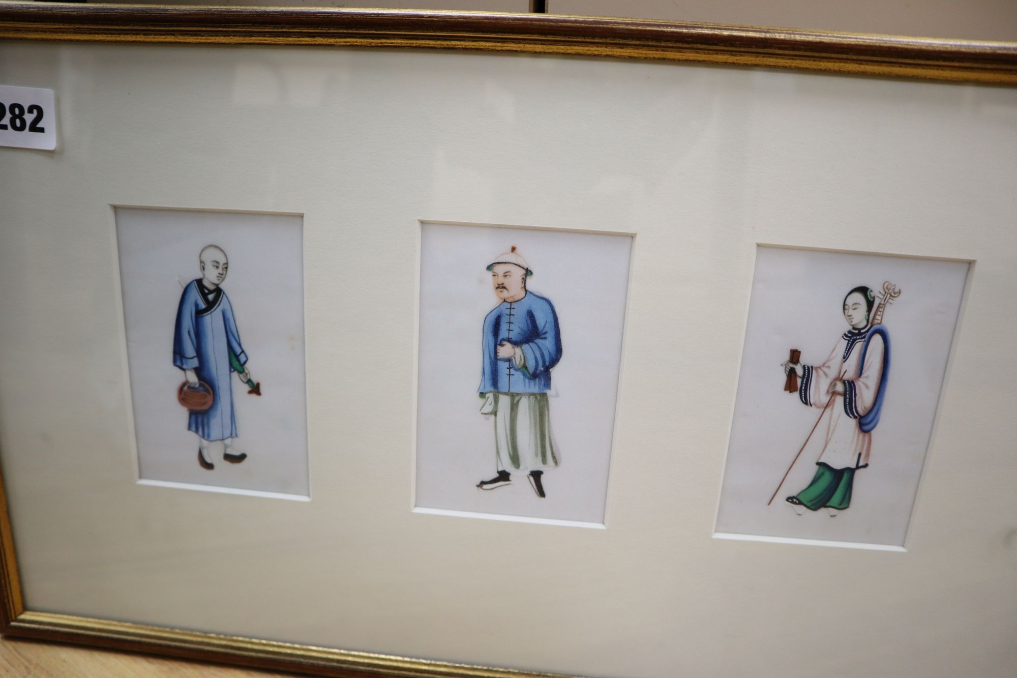 A pair of framed Chinese rice paper portrait groups and a pair of Chinese needlework sleeve bands, - Image 4 of 4