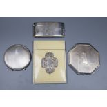 A George V silver concave card case, 82mm, two silver compacts including Art Deco with engraved