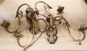 A pair of ormolu wall lights, width 65cmCONDITION: Good condition, in need of re-wiring