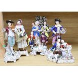 A Hochst style porcelain shepherd and shepherdess group and four other modern Continental figures,