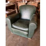 An Art Deco green leatherette armchair