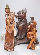 An Indonesian large carved wood model of a seated kylin, on plinth base and two Chinese rootwood