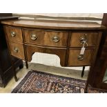 A George III style mahogany bow fronted sideboard, width 106cm, depth 53cm, height 84cm