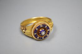 A Victorian diamond set enamelled gold bracelet, with central brilliant cut starburst and blue and