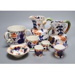 Eight pieces of Ironstone china including two jugs and a three handled cider mugCONDITION: One
