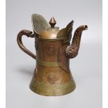 A Himalayan copper and brass teapot, height 20cm