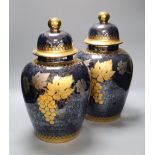 A pair of Artlynsa lustre and gilt decorated vases, height 43cmCONDITION: One vase neck rim