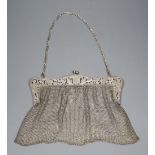A sterling evening bag, the clasp engraved with a confederate soldier, gross 8oz.CONDITION: