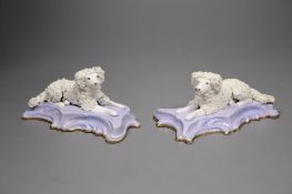 A good pair of Staffordshire porcelain figures of recumbent poodles, c.1835-50, 12.2cm long,