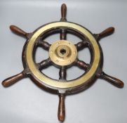 A small 19th century brass and hardwood ship's wheel, width 56cm