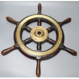 A small 19th century brass and hardwood ship's wheel, width 56cm