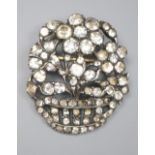 An early-mid 20th century white metal and paste set giardinetto brooch, 33mm, gross 9.4 grams.