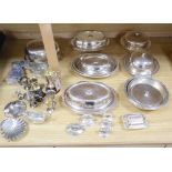 A quantity of plated items, including entree dishes and covers, two muffin dishes and covers and