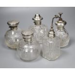 Two silver mounted glass atomisers and three silver mounted glass scent bottles, tallest overall