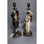 A pair of late 19th century French spelter figural candlesticks, height 41cm