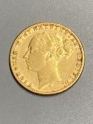 A Victoria 1876M gold sovereign, AVF.