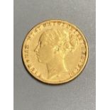 A Victoria 1876M gold sovereign, AVF.