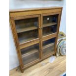 A Minty glazed oak two section bookcase, width 87cm depth 19cm height 113cm