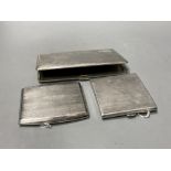 Three engine-turned silver cigarette cases, various, two with English hallmarks, one inscribed to