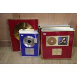 Sixteen various record presentation frames including Nigel Lovis, gold discs etc (16)