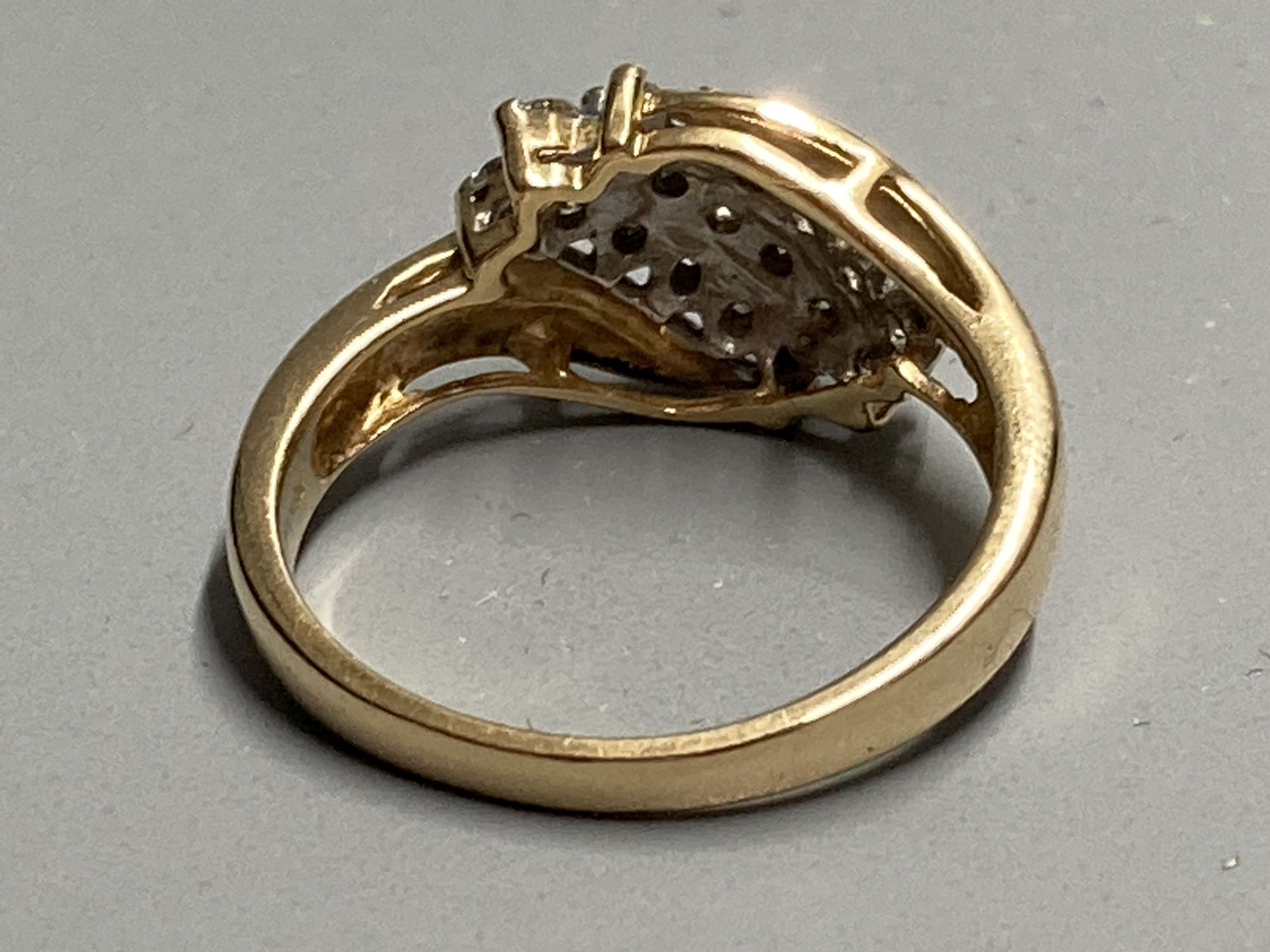 A modern 18ct gold and nineteen stone three stone three row diamond crossover ring, size N, gross - Image 3 of 3