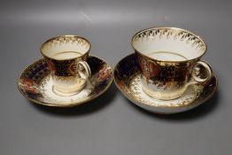 A Chamberlain Worcester cup and saucer in an imari style and a small cup and saucer in the same