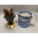 A pearlware fallow deer loving cup and a Martin Bros style bird jar and cover, height 22cm