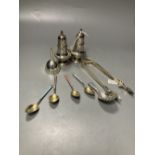 A pair of late Victorian silver pepperettes, London, 1891, 95mm, A George III silver caddy spoon,