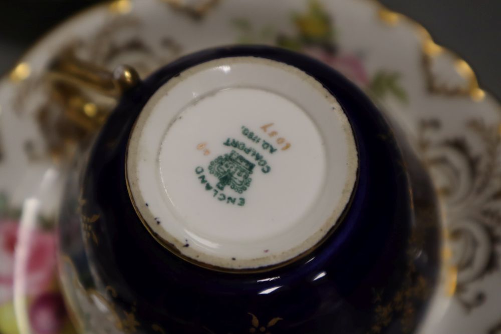 A Royal Crown Derby teacup, a saucer and a tea plate, hand painted with flowers date code 1912, a - Image 5 of 5