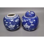 Two Chinese prunus pattern jars, one with a repaired cover, 14cm