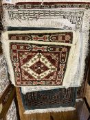 A Persian silk prayer rug and six other Eastern mats, largest 80 x 60cm (7)