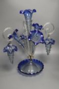 A Victorian blue and clear glass epergne, with trailed glass ornament, 49cm