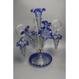 A Victorian blue and clear glass epergne, with trailed glass ornament, 49cm