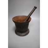 An 18th century iron pestle and mortar, pestle 16cm