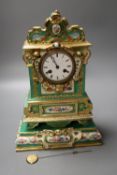 A 19th century French porcelain mantel clock, 33cm