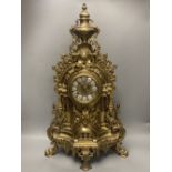 A large 20th century German brass mantel clock, 61cm