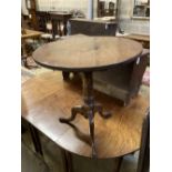 A George III circular mahogany tea table, diameter 68cm height 75cm