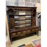 A George III oak dresser, width 186cm depth 46cm height 198cm