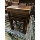 A nest of three Chinese hardwood occasional table, largest 45 x 31cm height 59cm