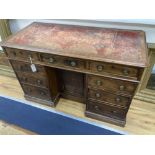 A Victorian mahogany kneehole writing desk, width 116cm depth 57cm height 77cm