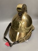 A reproduction brass fireman's helmet, height 27cm