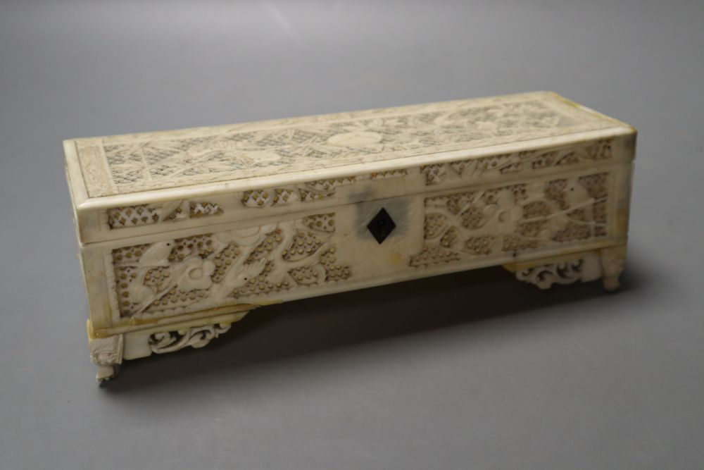 A 19th century Chinese ivory box, with finely carved and pierced detail, 18.5cm